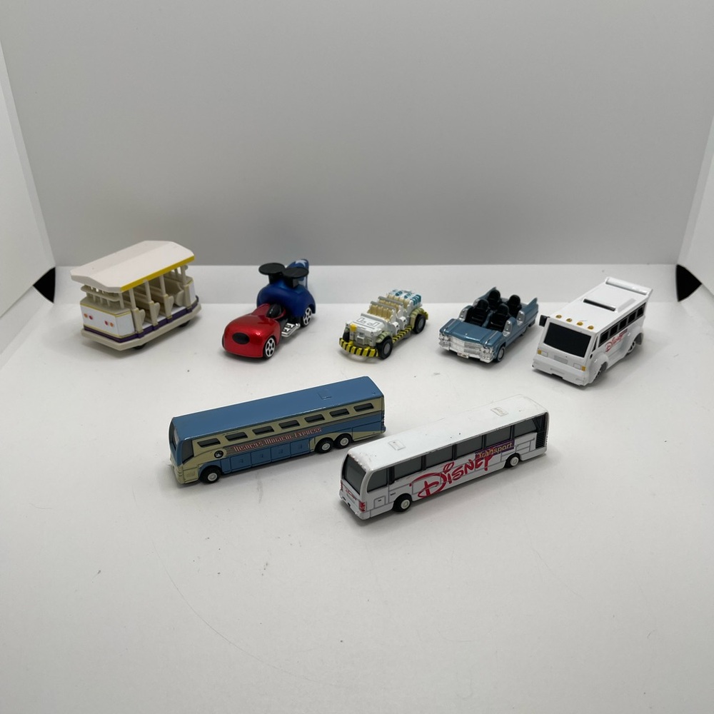 DISNEY TRANSPORTATION COLLECTION OF RARE TOYS BUSES & PARKING TRANSPORT SHUTTLE